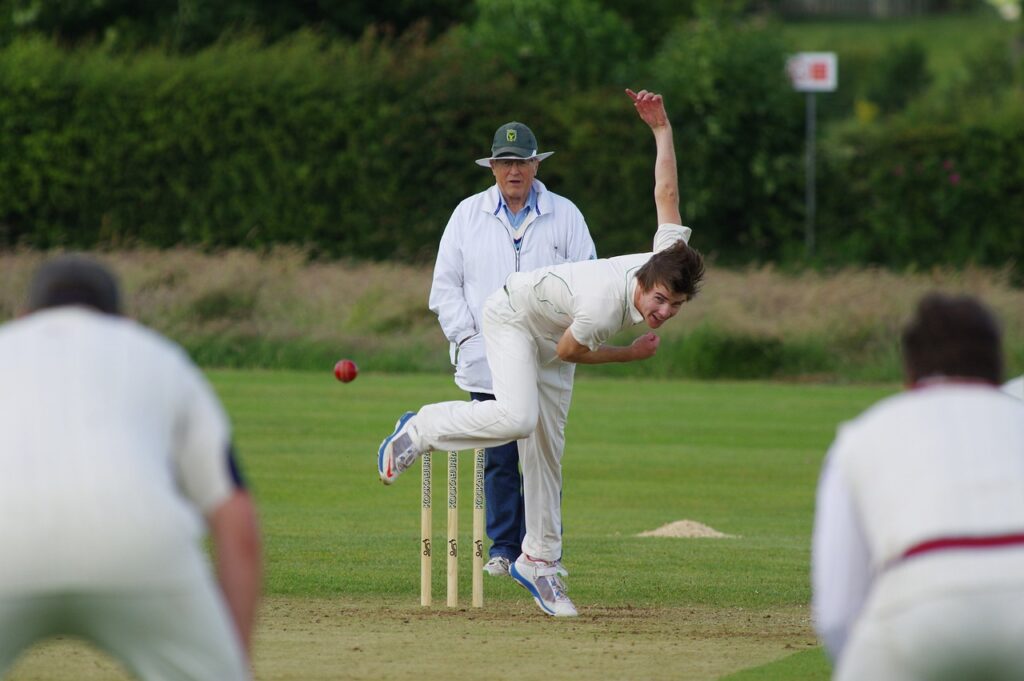 A bowler delivering a wide yorker.